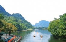 La réserve de Trang An en barque et en Vélo